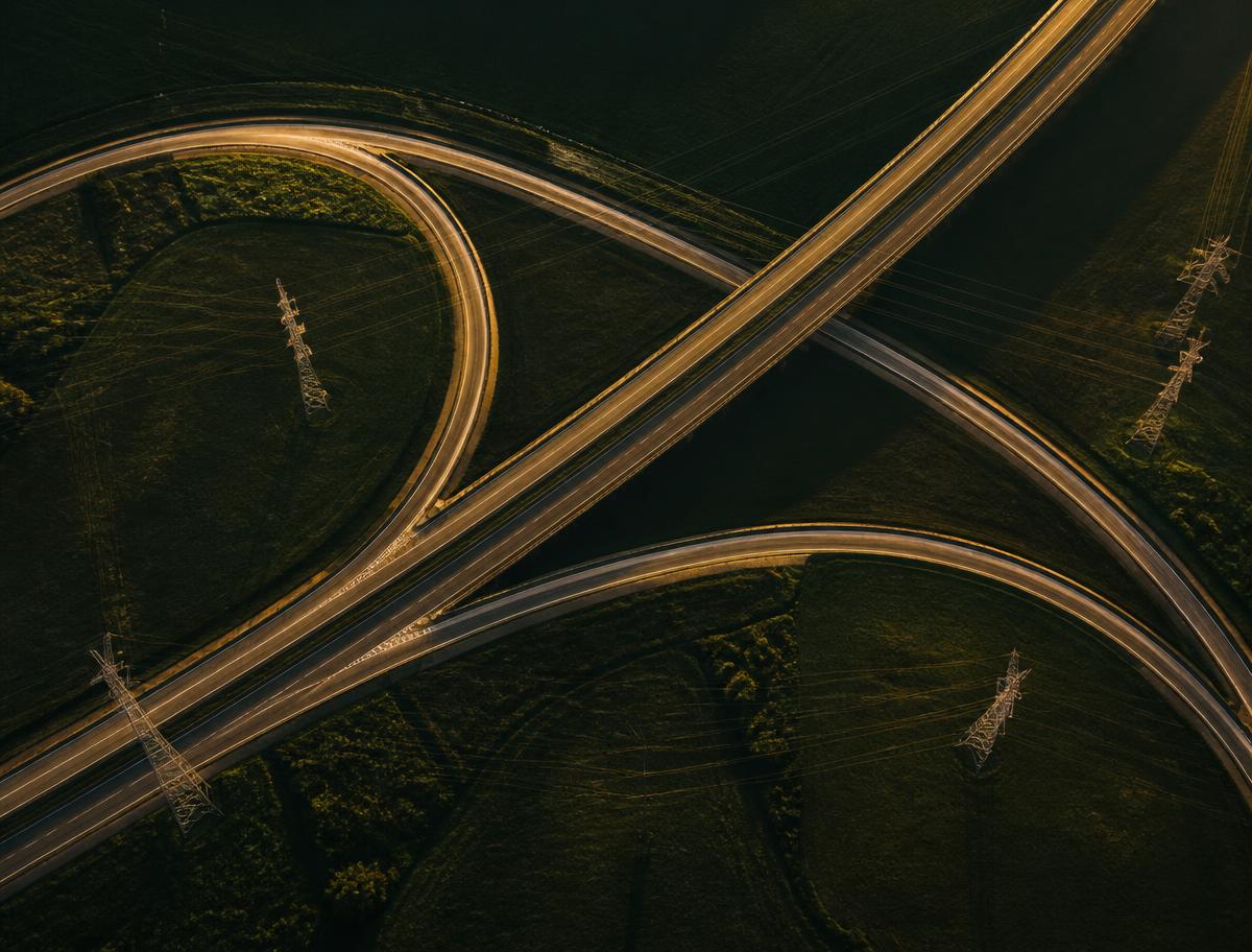 Abstract aerial pattern of infrastructure grids in green and gold